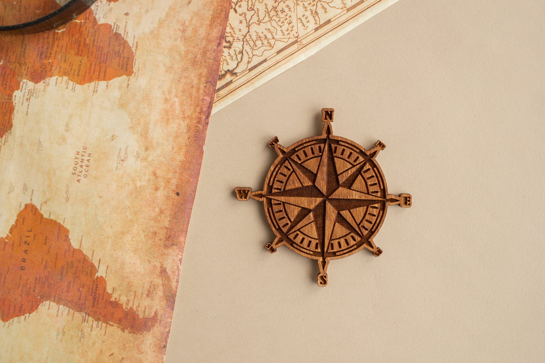 wind rose with maps on table